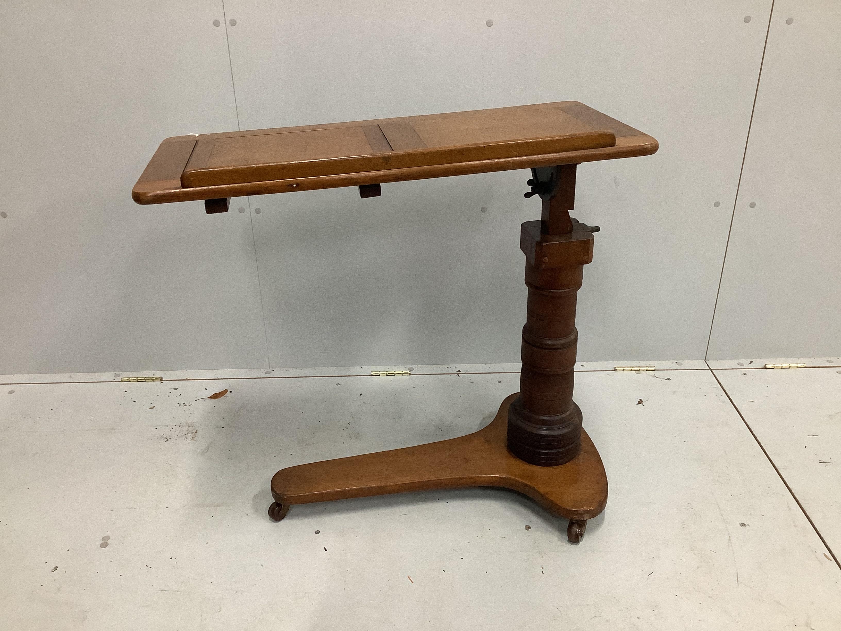 A Victorian mahogany adjustable reading table, width 81cm, depth 39cm
